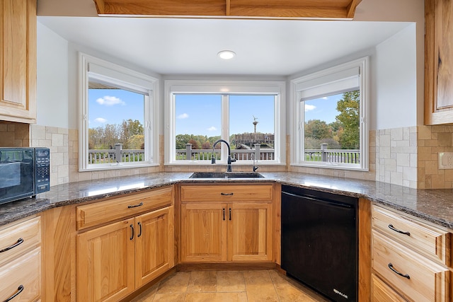 4700 Raap Rd, Bruce, MI 48065 - kitchen with black appliances, dark stone countertops, and decorative backsplash
