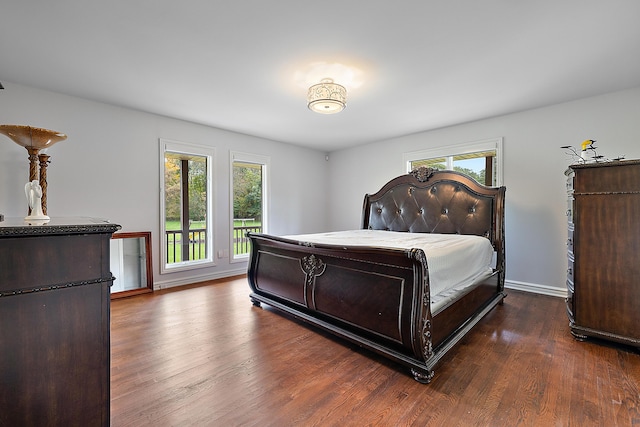 4700 Raap Rd, Bruce, MI 48065 - bedroom featuring wood finished floors and baseboards