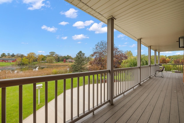 4700 Raap Rd, Bruce, MI 48065 - wooden deck with a yard and view of wooded area