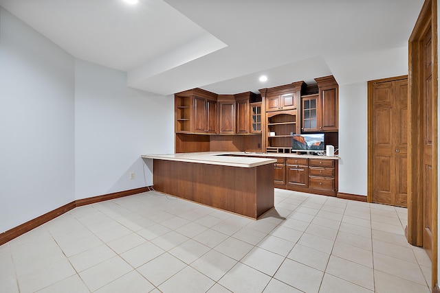 4700 Raap Rd, Bruce, MI 48065 - kitchen with open shelves, a peninsula, light countertops, recessed lighting, and glass insert cabinets