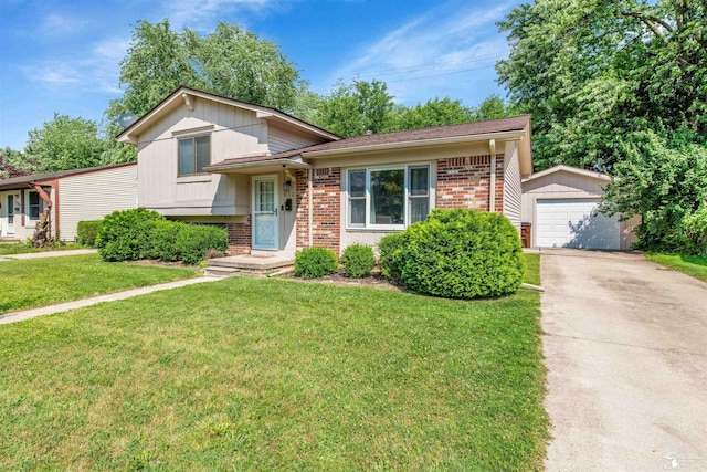632 John Rolfe Dr, Monroe, MI 48162 - split level home featuring brick siding, an outdoor structure, a front lawn, concrete driveway, and a detached garage