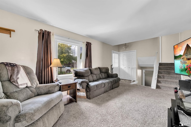 632 John Rolfe Dr, Monroe, MI 48162 - living room featuring carpet and stairs