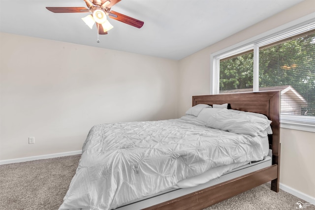 632 John Rolfe Dr, Monroe, MI 48162 - carpeted bedroom with baseboards and a ceiling fan