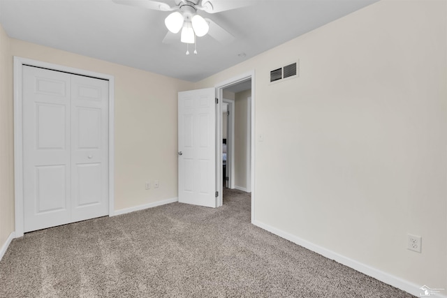 632 John Rolfe Dr, Monroe, MI 48162 - unfurnished bedroom featuring carpet, a closet, and ceiling fan