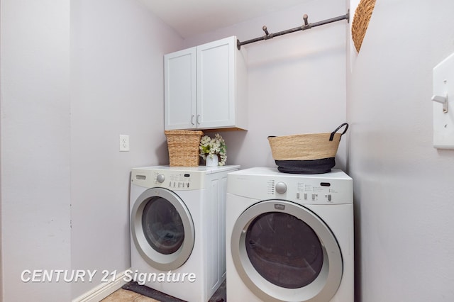 7320 N River Rd, Freeland, MI 48623 - washroom with cabinet space and washing machine and dryer