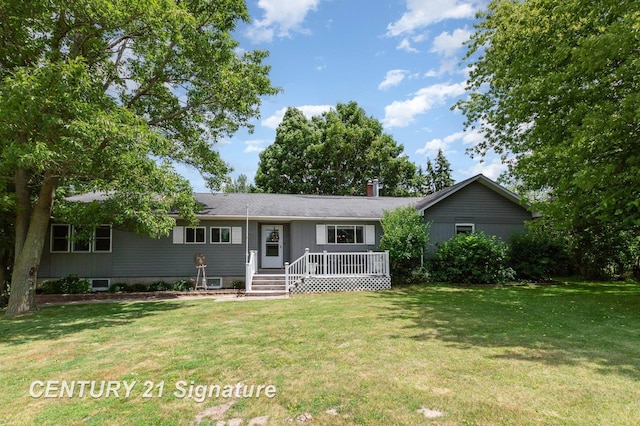 7320 N River Rd, Freeland, MI 48623 - ranch-style home with a front lawn, a chimney, and a deck