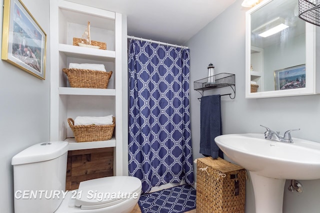 7320 N River Rd, Freeland, MI 48623 - bathroom featuring toilet and curtained shower