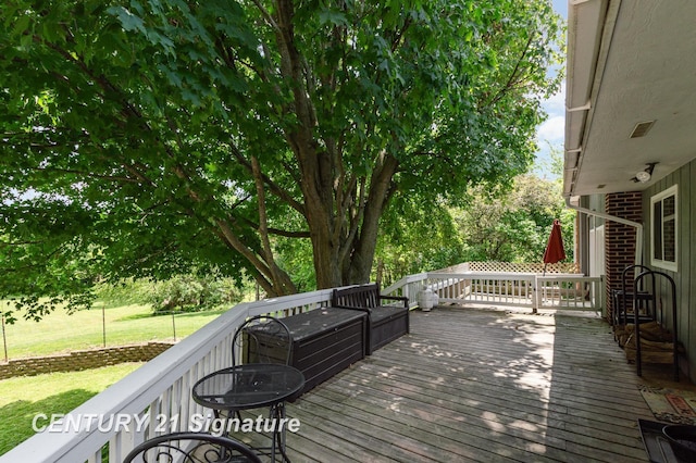 7320 N River Rd, Freeland, MI 48623 - wooden terrace with a lawn