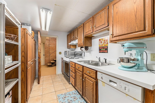 1818 Greenbriar Dr, Portage, MI 49024 - kitchen featuring range with electric cooktop, dishwasher, light tile patterned floors, and brown cabinetry