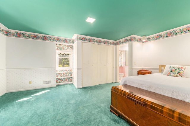 1818 Greenbriar Dr, Portage, MI 49024 - bedroom featuring carpet, wallpapered walls, a closet, and a wainscoted wall