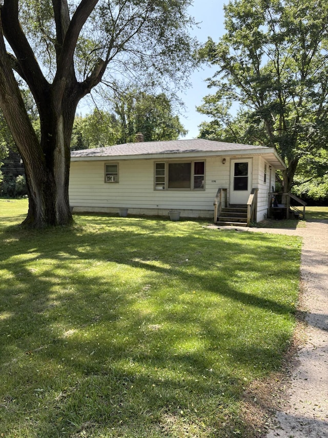 1596 Kay Dr, Benton Harbor, MI 49022 - view of front of house with a front yard, entry steps, and crawl space