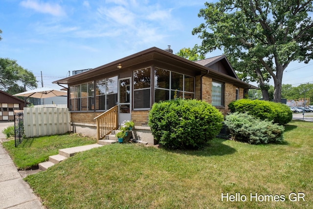 2250 Plainfield Ave NE, Grand Rapids, MI 49505 - view of front of house featuring entry steps and brick siding