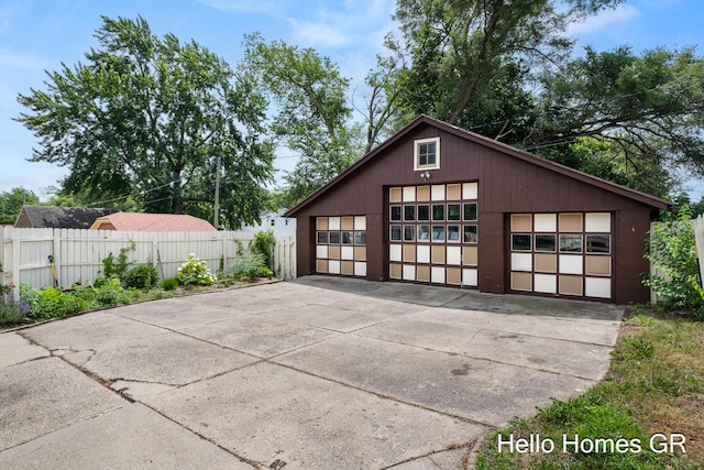 2250 Plainfield Ave NE, Grand Rapids, MI 49505 - mid-century home featuring a detached garage and an outdoor structure