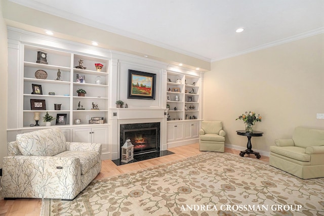 41 Bay Meadows Dr, Holland, MI 49424 - living room with crown molding, light wood-type flooring, a fireplace with flush hearth, built in features, and recessed lighting