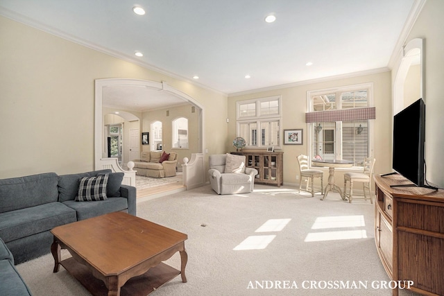 41 Bay Meadows Dr, Holland, MI 49424 - living room featuring ornamental molding, arched walkways, carpet, recessed lighting, and healthy amount of natural light