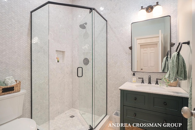 41 Bay Meadows Dr, Holland, MI 49424 - full bath featuring vanity, a shower stall, and tile walls