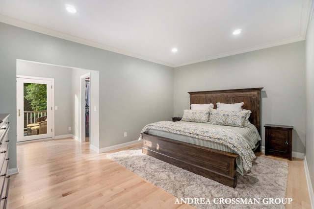 41 Bay Meadows Dr, Holland, MI 49424 - bedroom featuring light wood finished floors, ornamental molding, access to exterior, recessed lighting, and a walk in closet