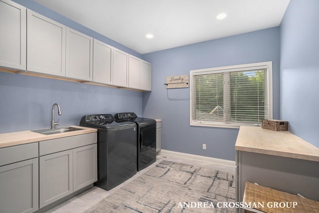 41 Bay Meadows Dr, Holland, MI 49424 - washroom featuring washing machine and dryer, cabinet space, and recessed lighting