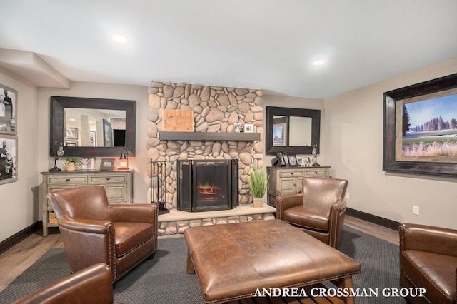 41 Bay Meadows Dr, Holland, MI 49424 - living area with wood finished floors, a fireplace, and recessed lighting