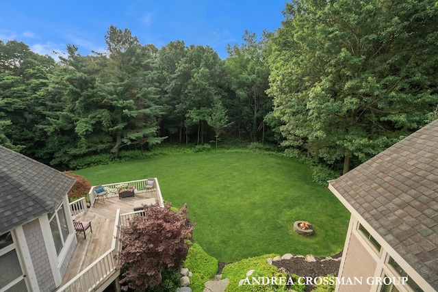 41 Bay Meadows Dr, Holland, MI 49424 - view of green lawn with a wooden deck