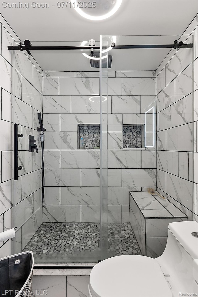 17952 Marsal Dr, Macomb, MI 48042 - bathroom featuring marble finish flooring and a stall shower