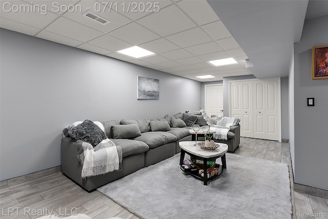 17952 Marsal Dr, Macomb, MI 48042 - living room with a paneled ceiling and wood finished floors