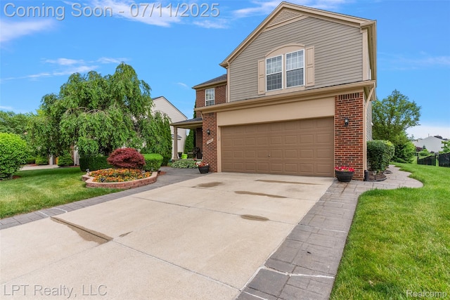 17952 Marsal Dr, Macomb, MI 48042 - traditional home with brick siding, a garage, a front yard, and driveway