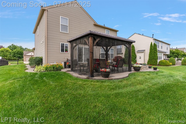 17952 Marsal Dr, Macomb, MI 48042 - rear view of house with a gazebo, a yard, and a patio