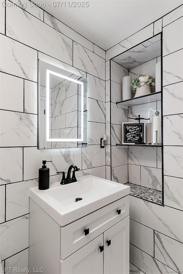 17952 Marsal Dr, Macomb, MI 48042 - bathroom featuring vanity and tile walls
