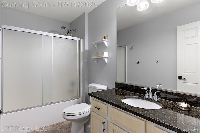 17952 Marsal Dr, Macomb, MI 48042 - bathroom featuring vanity, enclosed tub / shower combo, and tile patterned flooring