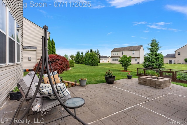 17952 Marsal Dr, Macomb, MI 48042 - view of patio / terrace with an outdoor fire pit
