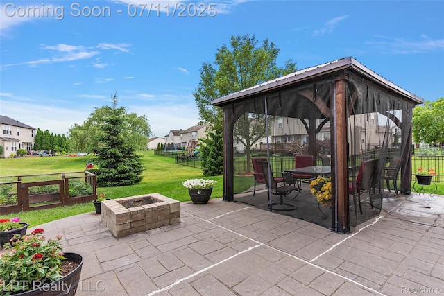 17952 Marsal Dr, Macomb, MI 48042 - view of patio featuring an outdoor fire pit, a gazebo, and a residential view