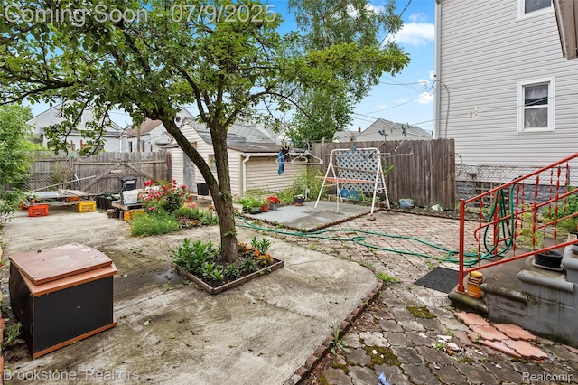 3831 Casmere St, Hamtramck, MI 48212 - fenced backyard featuring a patio and an outdoor structure