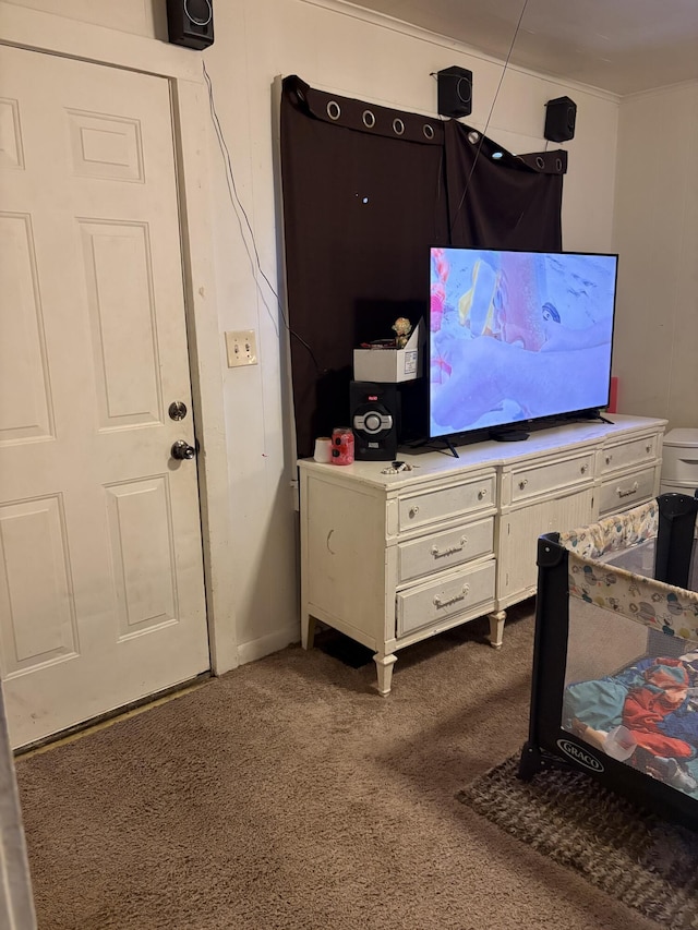 1016 Villa Ct, Benton Harbor, MI 49022 - living area featuring dark colored carpet and crown molding