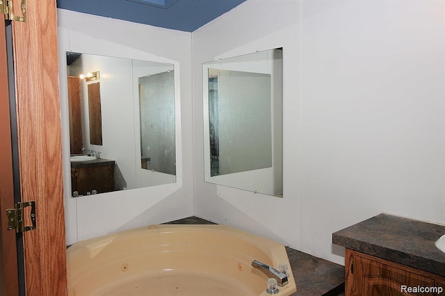 325 Yorkshire, Newport, MI 48166 - bathroom featuring vanity and a tub with jets