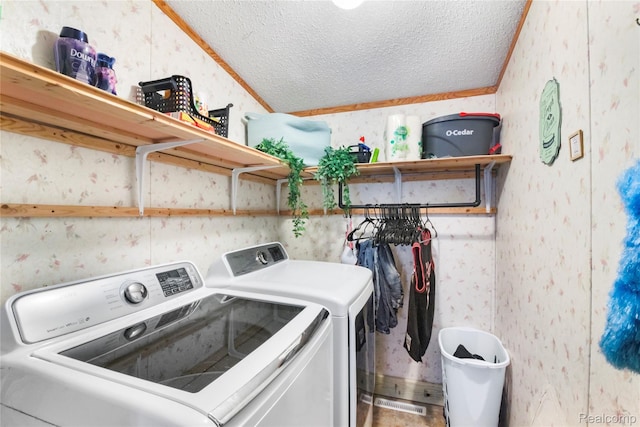 325 Yorkshire, Newport, MI 48166 - laundry area with wallpapered walls, washer and clothes dryer, and a textured ceiling