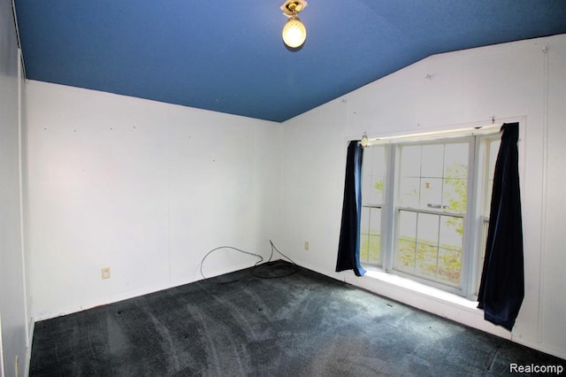 325 Yorkshire, Newport, MI 48166 - carpeted spare room with lofted ceiling