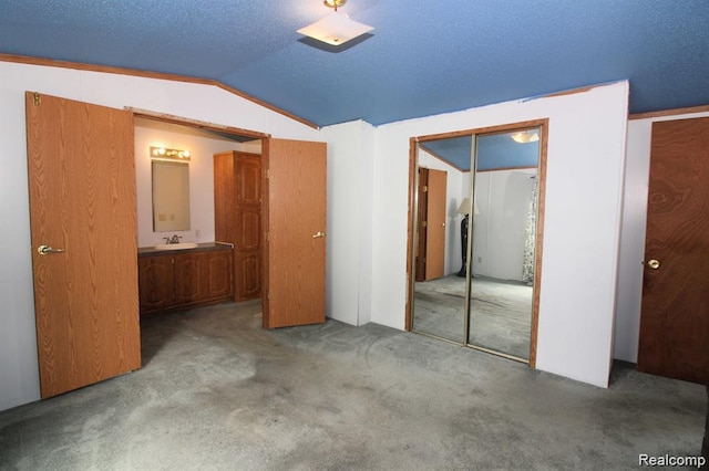 325 Yorkshire, Newport, MI 48166 - unfurnished bedroom featuring lofted ceiling, carpet flooring, a closet, and connected bathroom