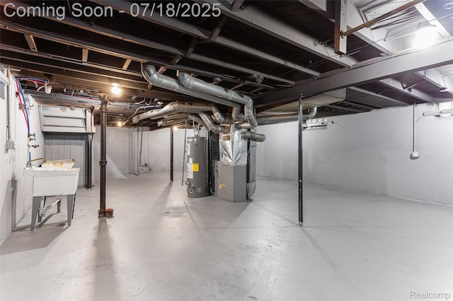 19132 Gilchrist St, Detroit, MI 48235 - unfinished basement with gas water heater and heating unit