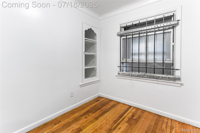 19132 Gilchrist St, Detroit, MI 48235 - unfurnished room featuring baseboards and wood finished floors