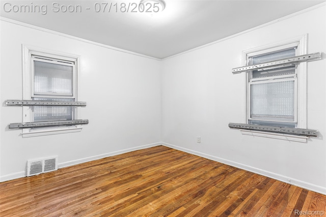 19132 Gilchrist St, Detroit, MI 48235 - spare room featuring wood finished floors and ornamental molding