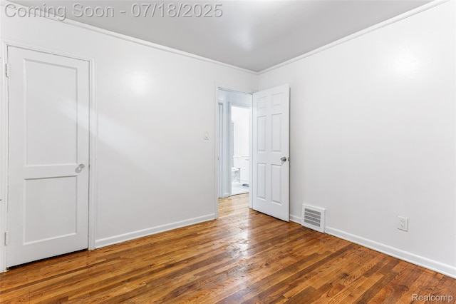 19132 Gilchrist St, Detroit, MI 48235 - empty room featuring crown molding and wood finished floors