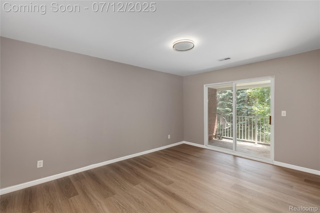 5548 Pine Aires Dr, Sterling Heights, MI 48314 - unfurnished room with wood finished floors and baseboards