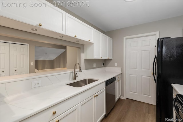 5548 Pine Aires Dr, Sterling Heights, MI 48314 - kitchen with freestanding refrigerator, dishwasher, dark wood-style flooring, white cabinets, and light stone countertops
