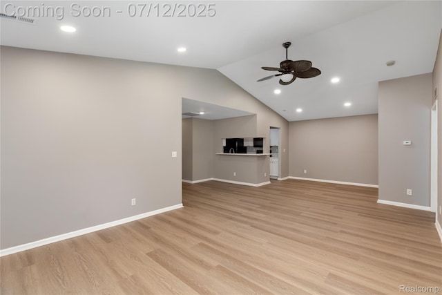 5548 Pine Aires Dr, Sterling Heights, MI 48314 - unfurnished living room with a ceiling fan, light wood-style flooring, vaulted ceiling, and recessed lighting