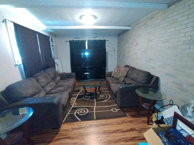 3539 14th St, Wyandotte, MI 48192 - living room with brick wall and wood finished floors