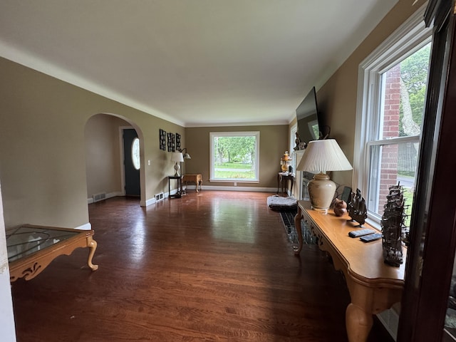 2728 Brook Dr, Kalamazoo, MI 49004 - living room with arched walkways and wood finished floors