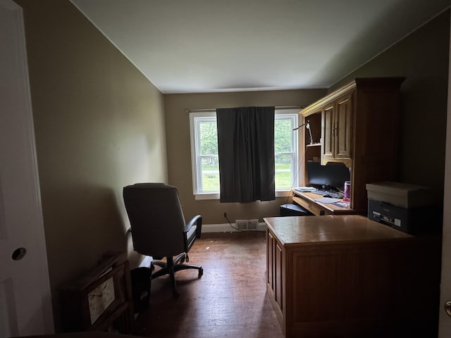 2728 Brook Dr, Kalamazoo, MI 49004 - home office featuring dark wood-style floors and baseboards