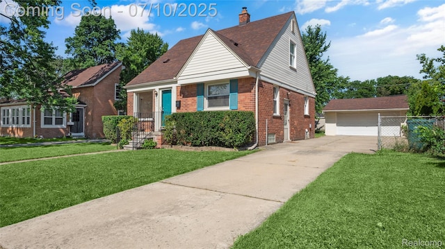 2606 Willow St, Dearborn, MI 48124 - bungalow-style home featuring brick siding, a chimney, and a detached garage