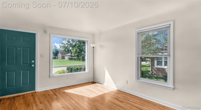 2606 Willow St, Dearborn, MI 48124 - entrance foyer with baseboards and wood finished floors